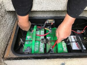 Your RV Inspector John testing the house batteries