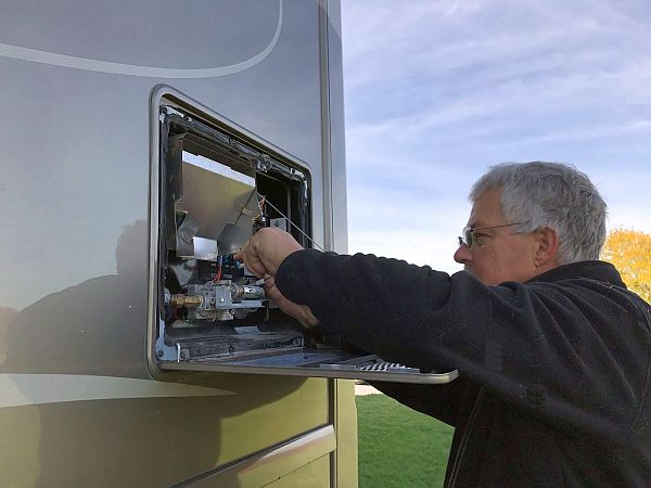 Your RV Inspector John checking the hot water system